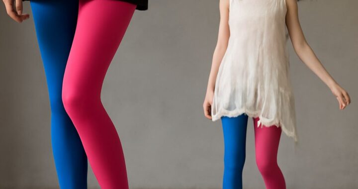 Colorful tights styled with a short skirt and ankle boots