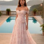 Petite wearer in a long evening gown at a formal event