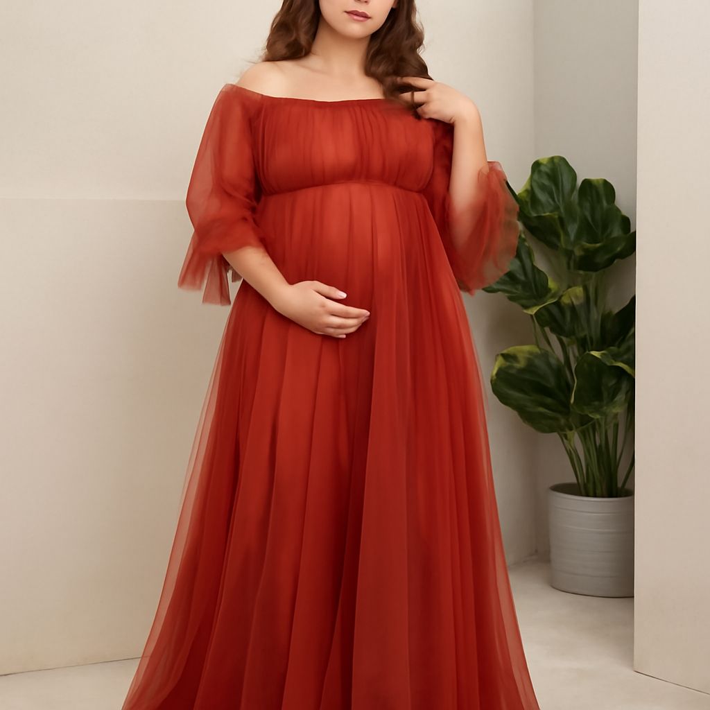 Expecting mother wearing a stylish maternity dress at a baby shower